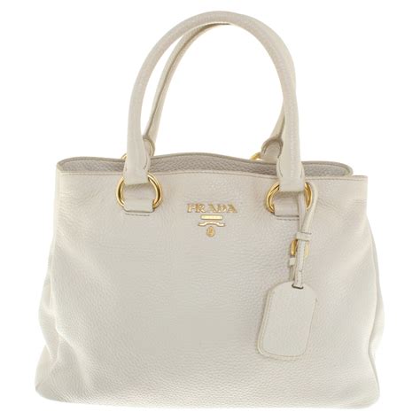 cream prada bag|Prada bag list.